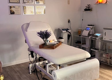 Relaxing spa room at Brazilian Beauty Spa in Peabody, Massachusetts, US with a massage table and soft lighting.
