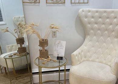 Elegant chair and decor at Brazilian Beauty Spa, Peabody, Massachusetts, US enhancing a serene ambiance.