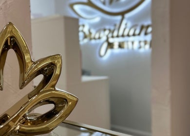 Golden lotus decor at Brazilian Beauty Spa, Peabody, Massachusetts, US, exuding elegance and tranquility.