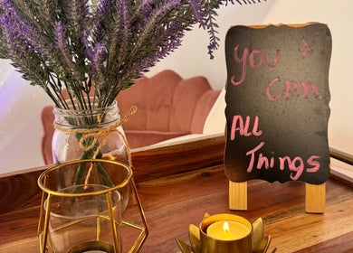 Inspirational decor at Brazilian Beauty Spa in Peabody, Massachusetts, US with lavender and candle.