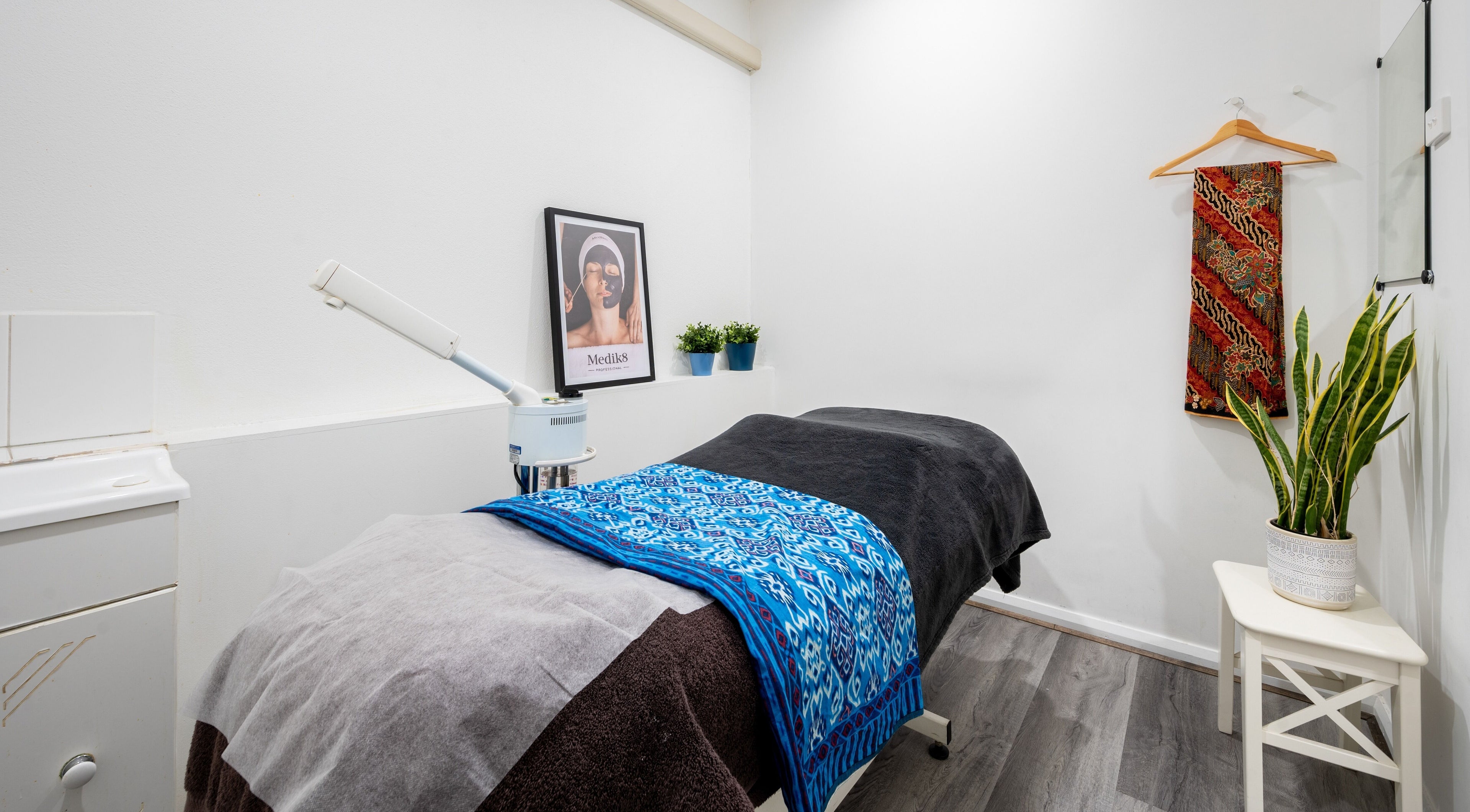 Relaxing treatment room at Bay Medical Aesthetics in Black Rock, VIC, AU with serene decor and therapy bed.