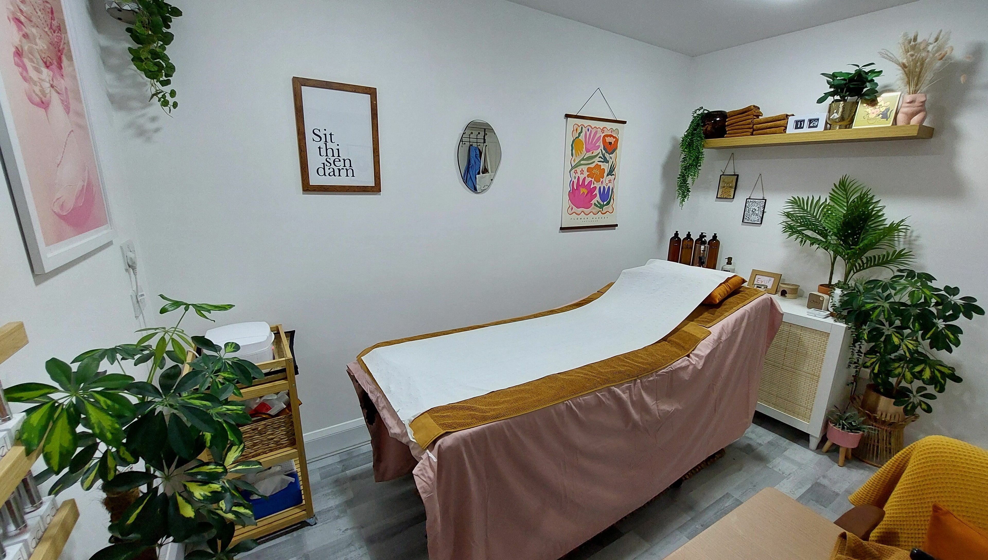 Relaxing therapy room at T'Studio, Basingstoke, England, GB with cozy décor and a comfortable treatment bed.