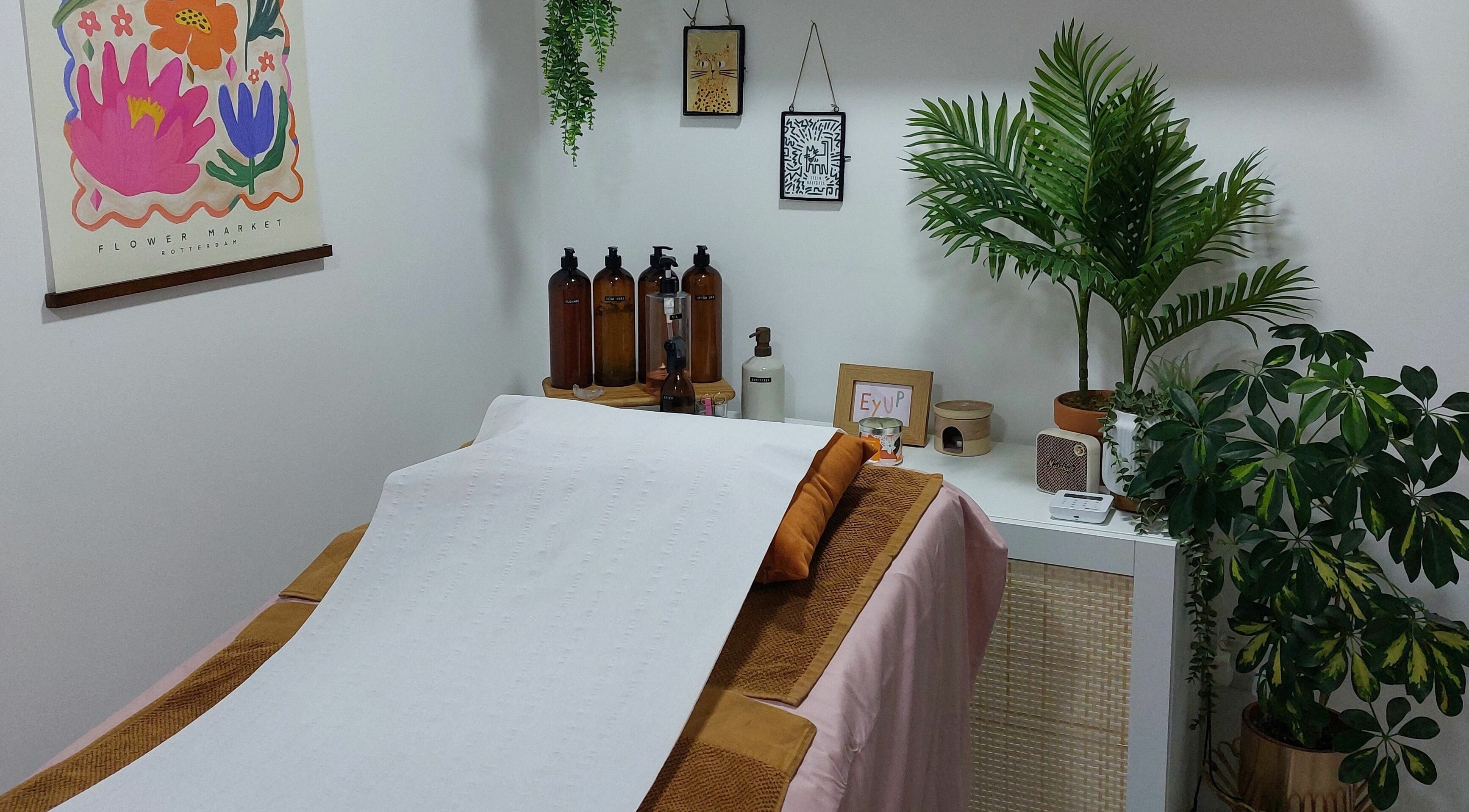 Calm spa room at T'Studio, Basingstoke, England, GB with massage bed and serene decor.