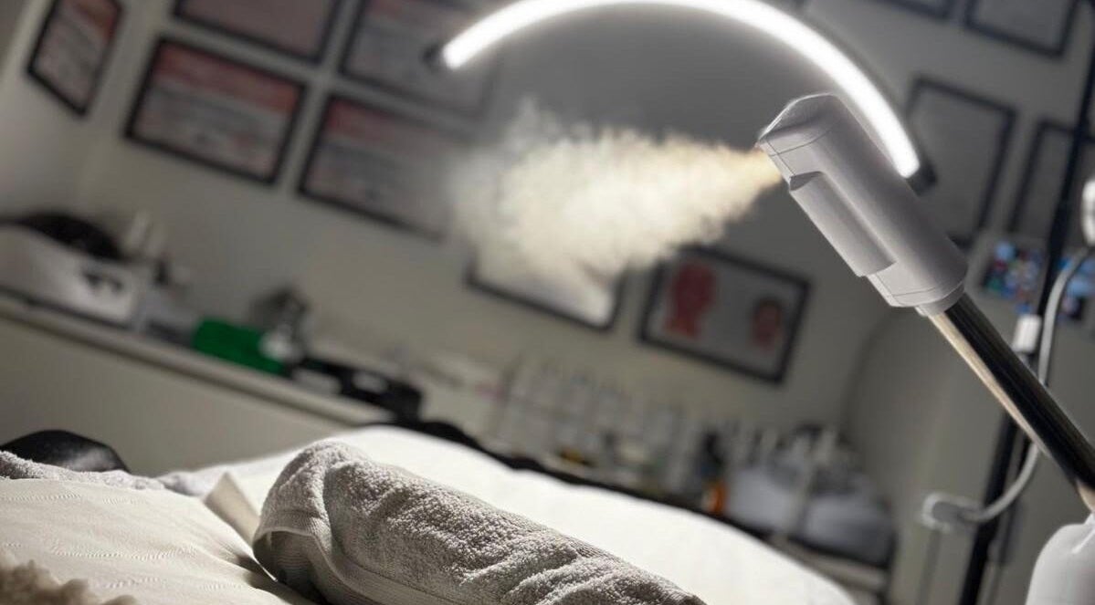 Elegant steam room setup at AC House Of Aesthetics, London, England, GB, exudes relaxation and luxury.