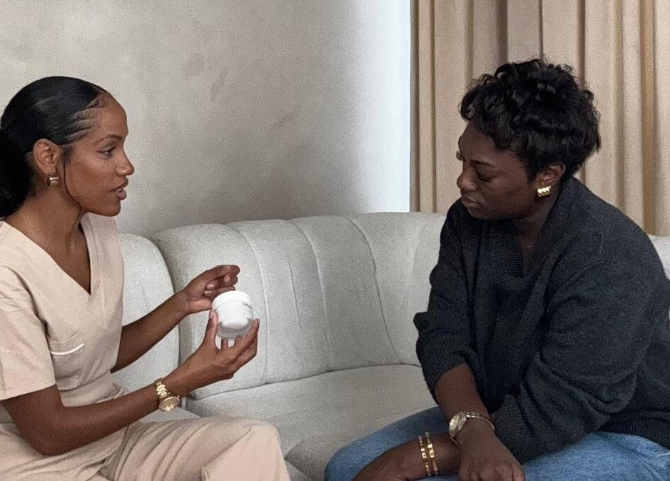 Consultation at AC House Of Aesthetics, London, England, GB with professional discussing skincare.