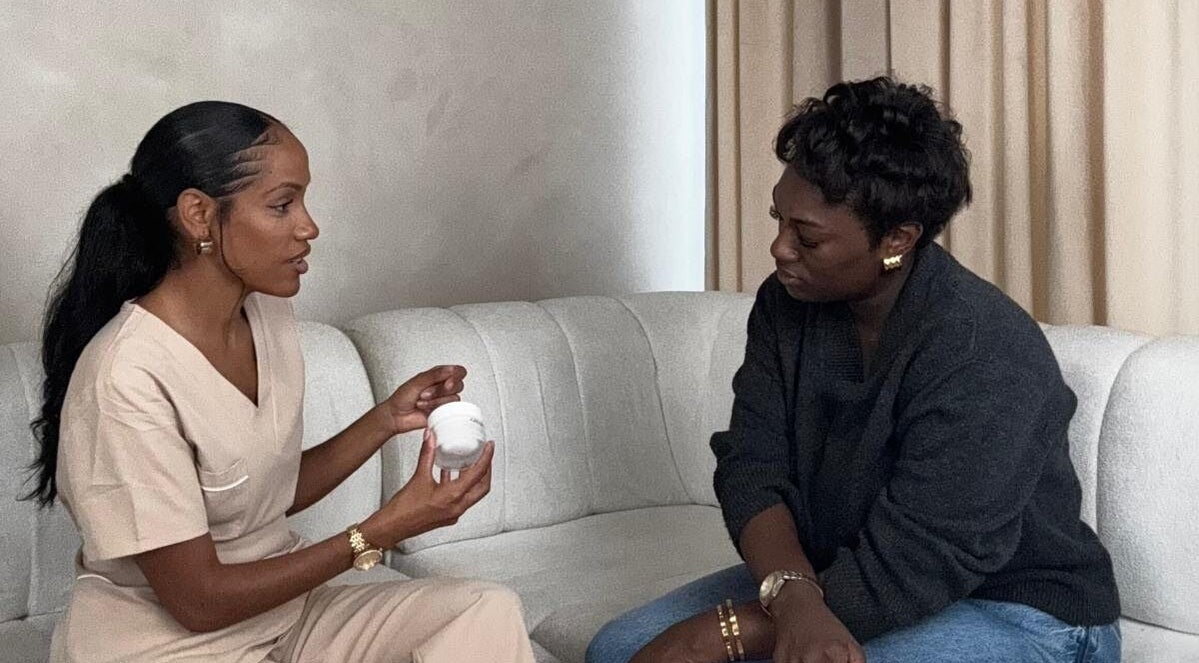 Consultation at AC House Of Aesthetics, London, England, GB with professional discussing skincare.