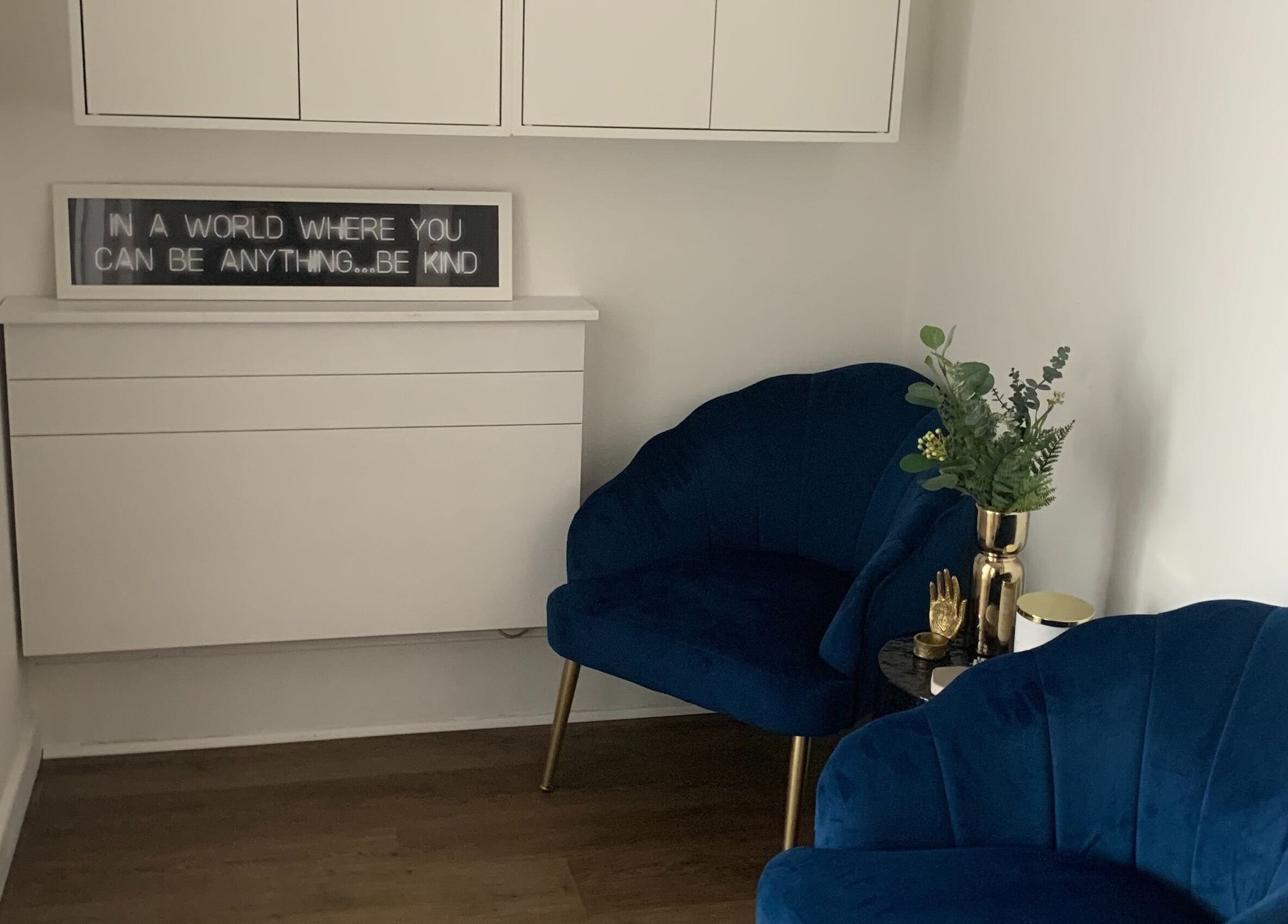 Elegant blue chairs and decor at Forfacesakeuk, HIGH WYCOMBE, England, GB, creating a welcoming atmosphere.