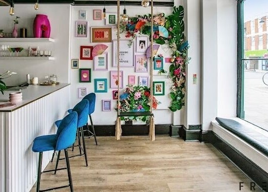 Stylish interior of Forfacesakeuk in HIGH WYCOMBE, England, GB with vibrant decor and seating.