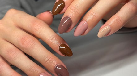 Elegant manicure with earthy tones at Nails by Em, Gloucester, England, GB.
