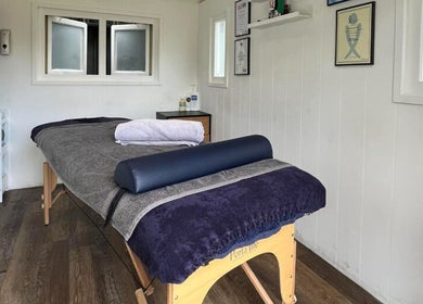 Cozy massage room at CJ Soft Tissue & Massage Therapy, Wellington, England, GB, featuring a relaxing ambiance.