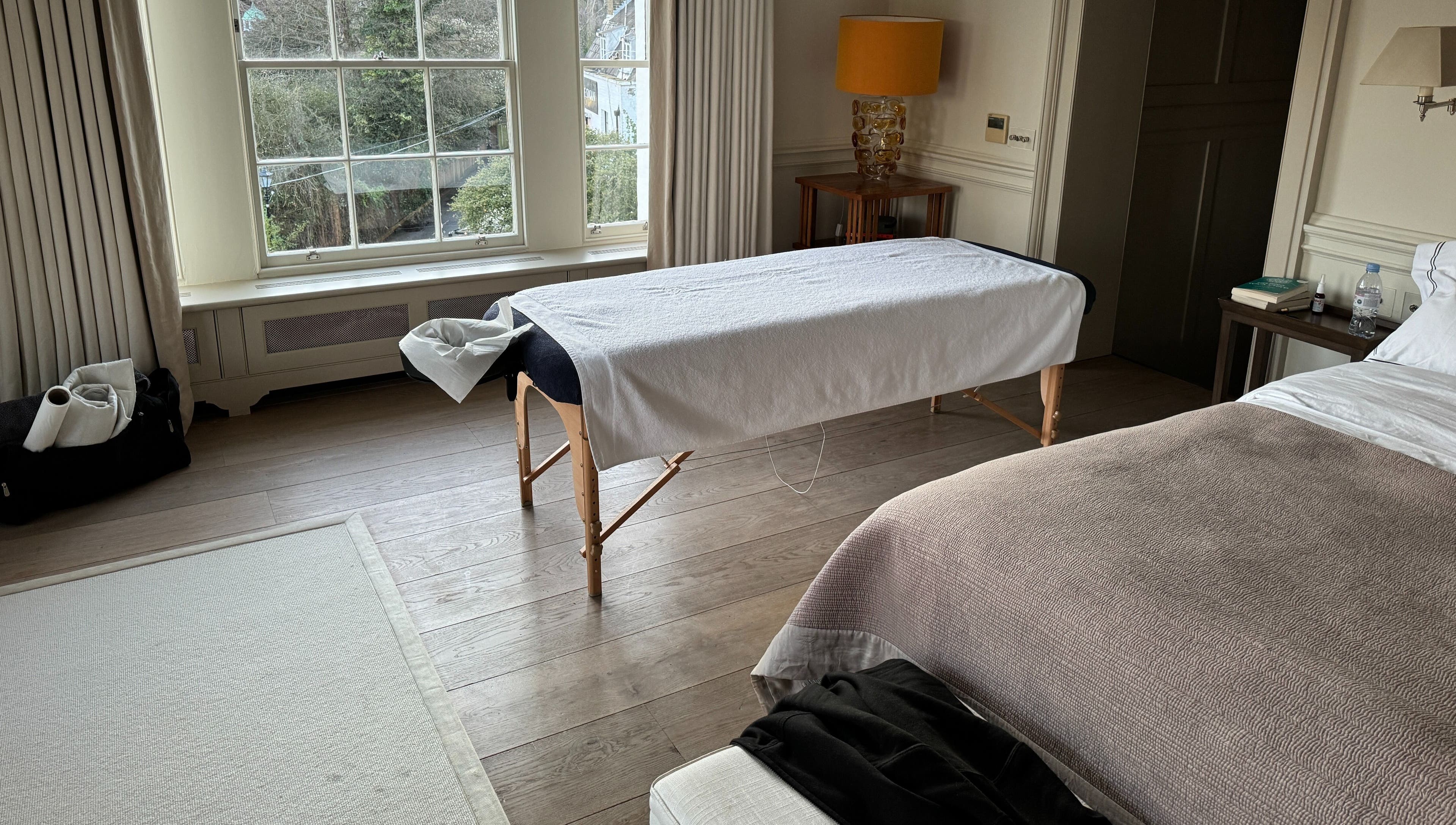 Massage table set in a serene room for Paul Massage at Home, Home Service, GB.