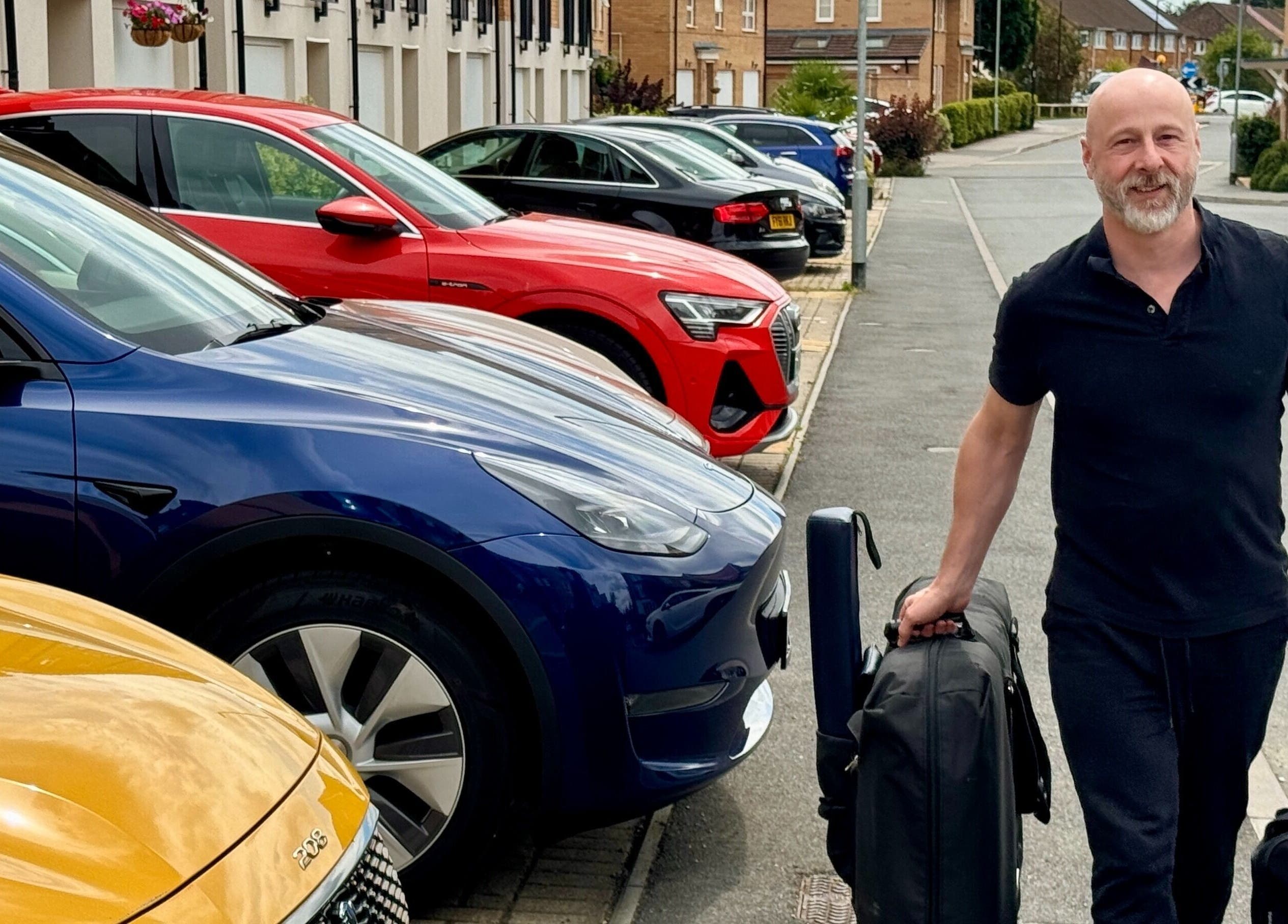 Paul Massage at Home therapist arriving with equipment, Home Service, GB.