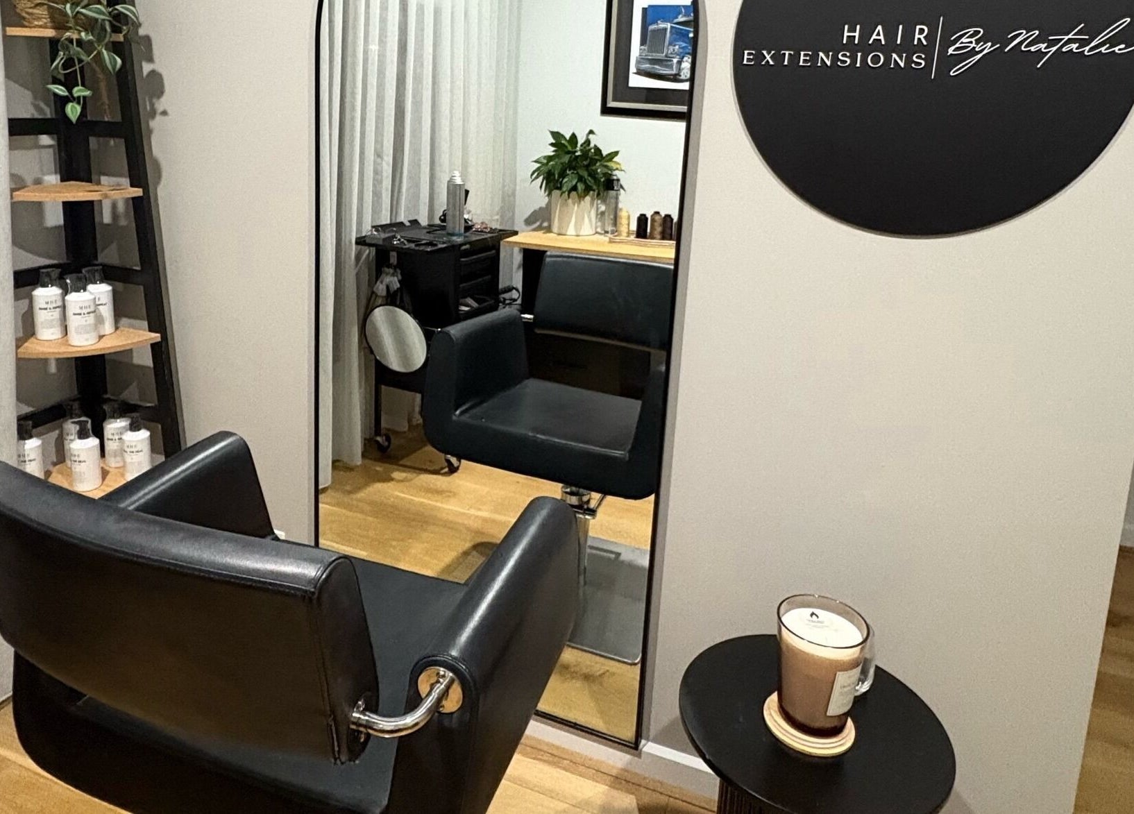Sleek salon chair and mirror at Hair Extensions by Natalie in Gisborne, Victoria, AU, exuding elegance.
