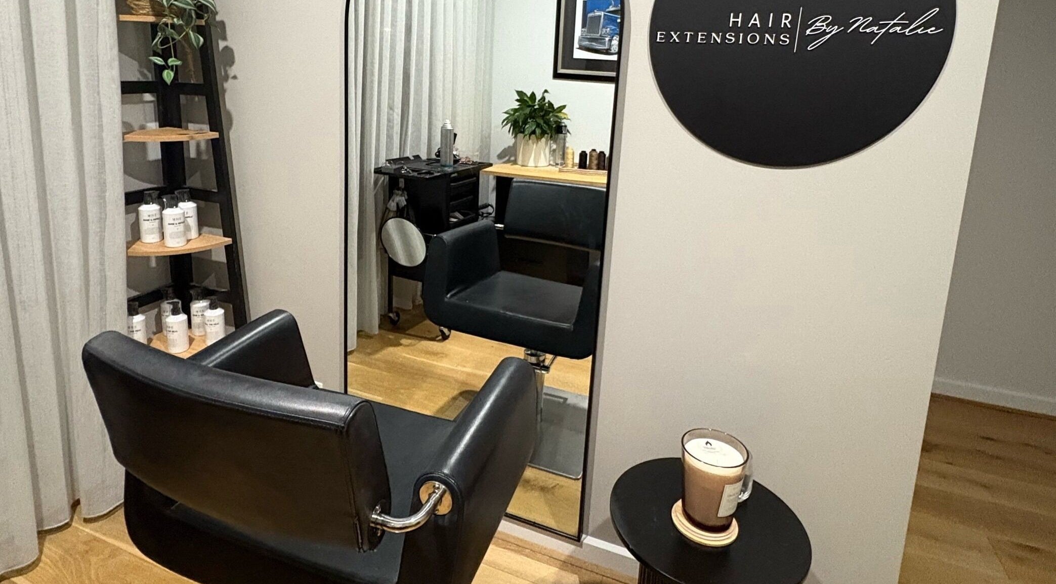 Sleek salon chair and mirror at Hair Extensions by Natalie in Gisborne, Victoria, AU, exuding elegance.