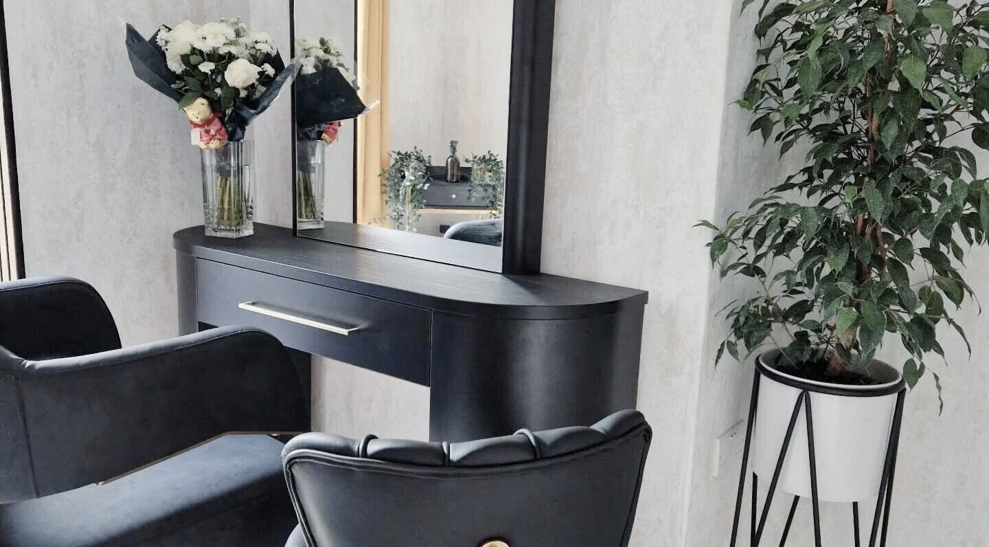 Elegant seating area at Brazilian Vibes Studio, London, England, GB with chic decor and greenery.