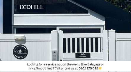Entrance of ECOHILL Hair Boutique in Boondall, Queensland, AU, showcasing modern design and inviting ambiance.