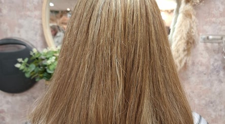 Beautifully styled golden hair at Hair by Daisy, Hereford, England, GB, showcasing expert hair care.