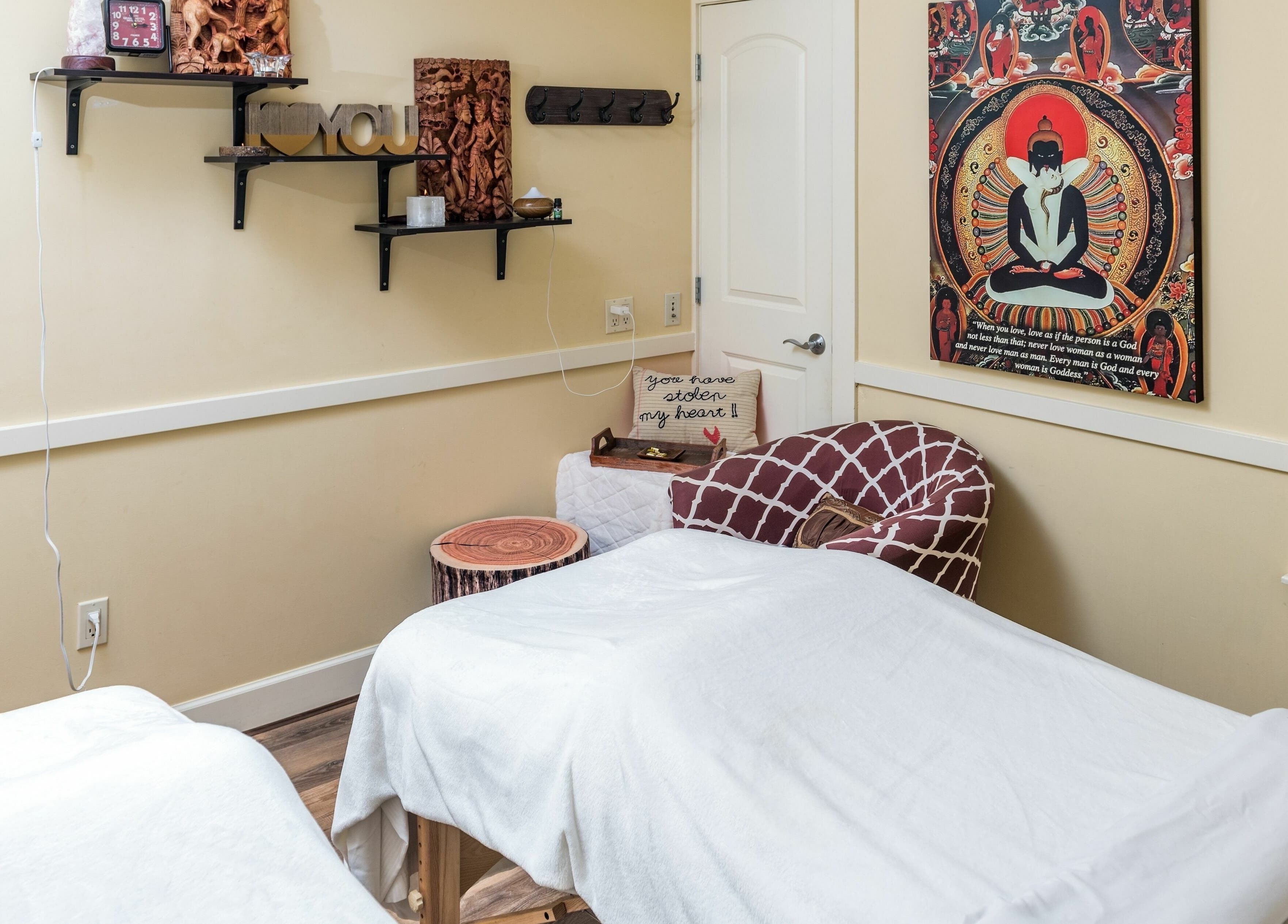 Relaxing treatment room at Kamal's Day Spa in Delta, British Columbia, CA with zen decor and cozy ambiance.