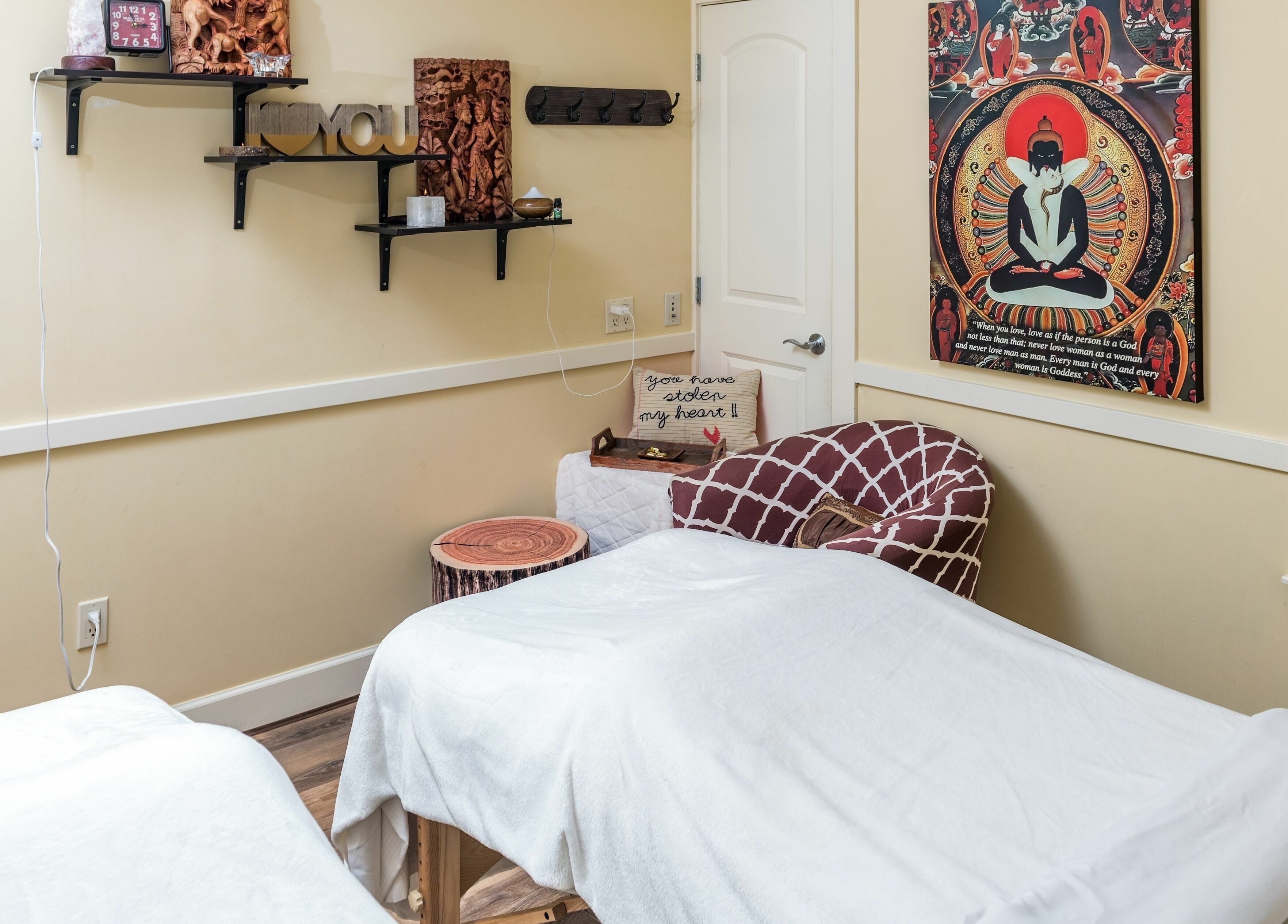 Relaxing treatment room at Kamal's Day Spa in Delta, British Columbia, CA with zen decor and cozy ambiance.