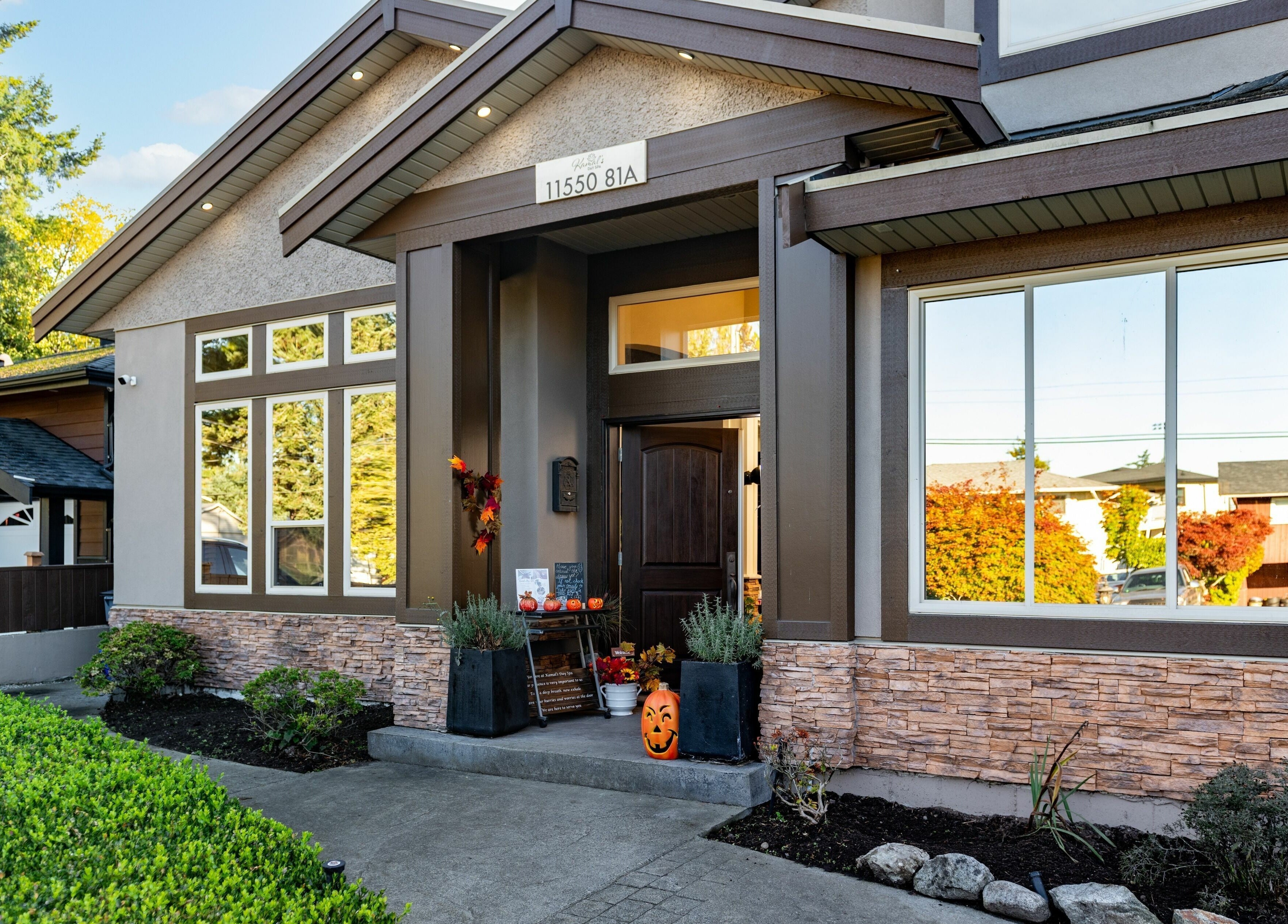 Charming entrance of Kamal's Day Spa in warm autumn decor, Delta, British Columbia, CA.