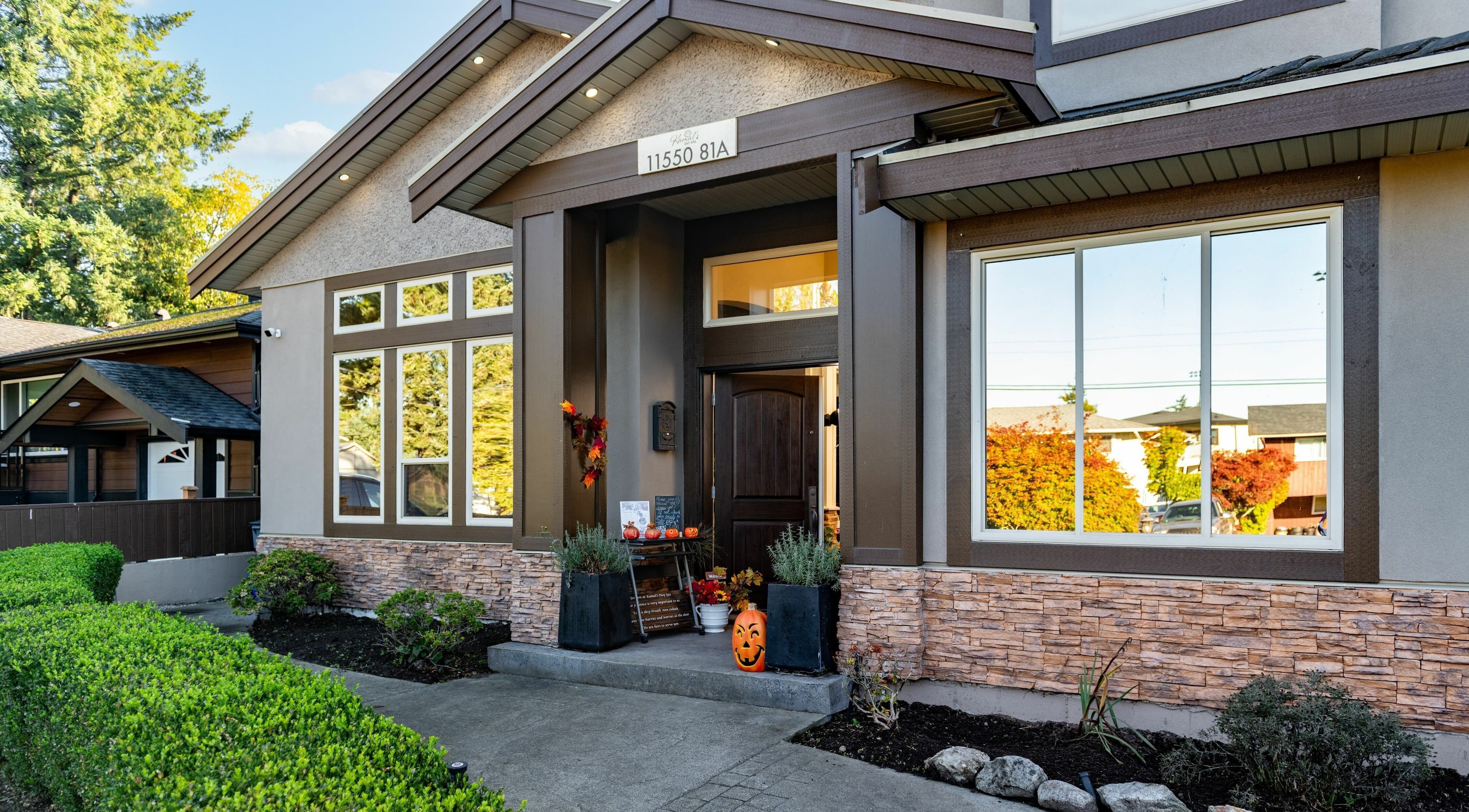 Charming entrance of Kamal's Day Spa in warm autumn decor, Delta, British Columbia, CA.