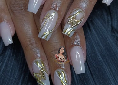 Elegant nail art with gold butterfly design at The Beauty spot at nailsby.metisha, Queensburgh, Kwazulu-natal, ZA.
