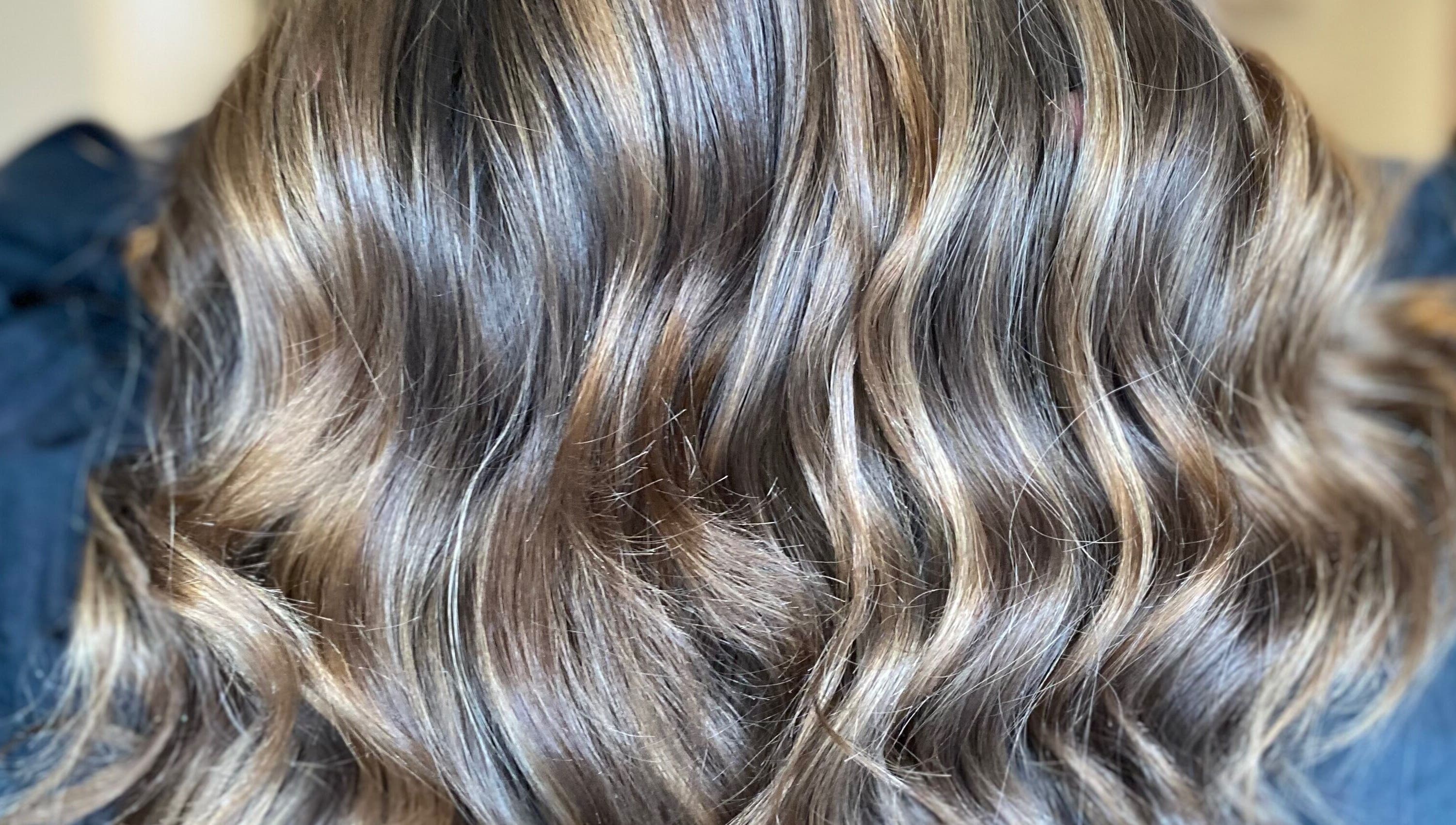 Shiny, styled wavy hair at G.C Hair, Crowthorne, England, GB salon, showcasing expert haircare.