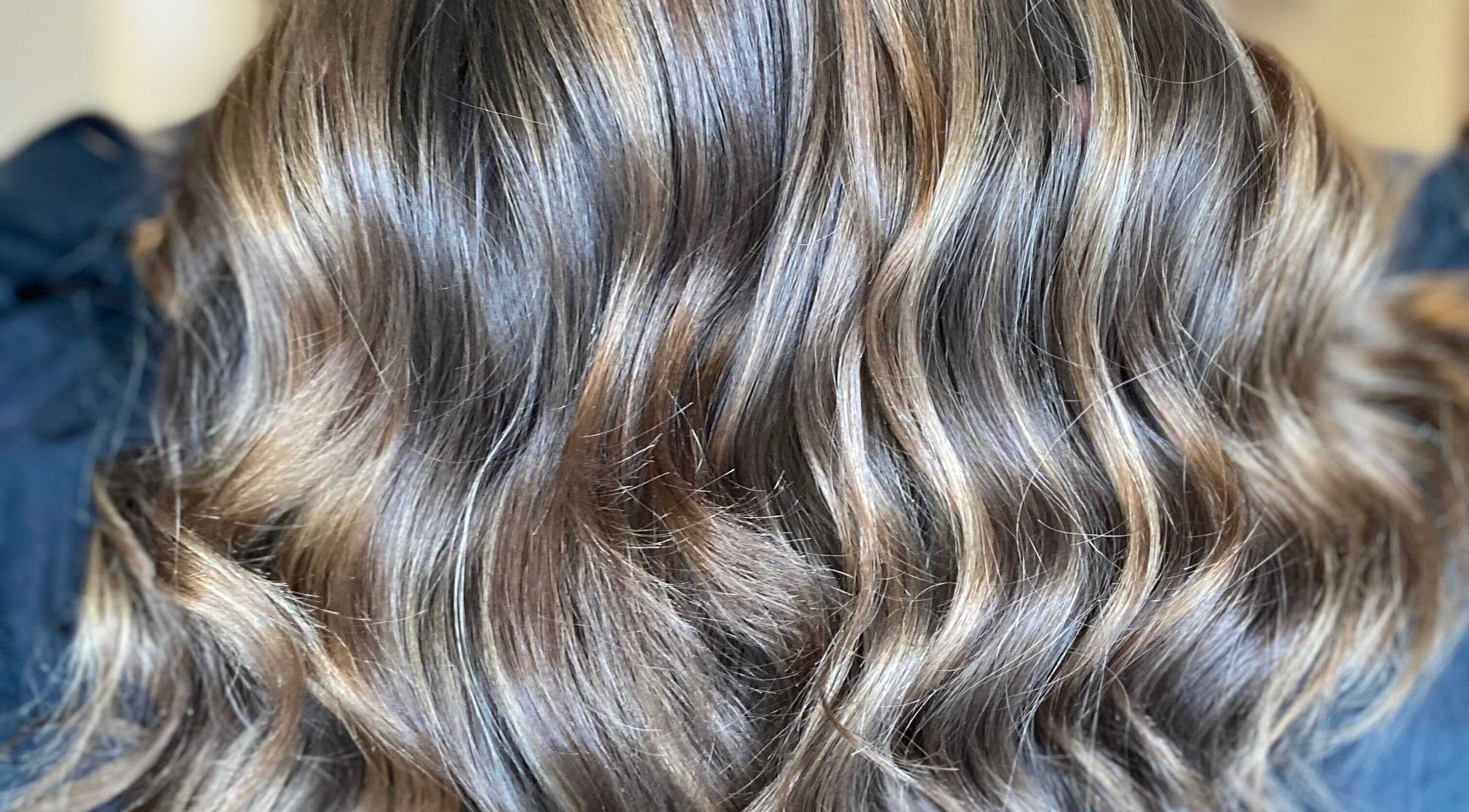 Shiny, styled wavy hair at G.C Hair, Crowthorne, England, GB salon, showcasing expert haircare.