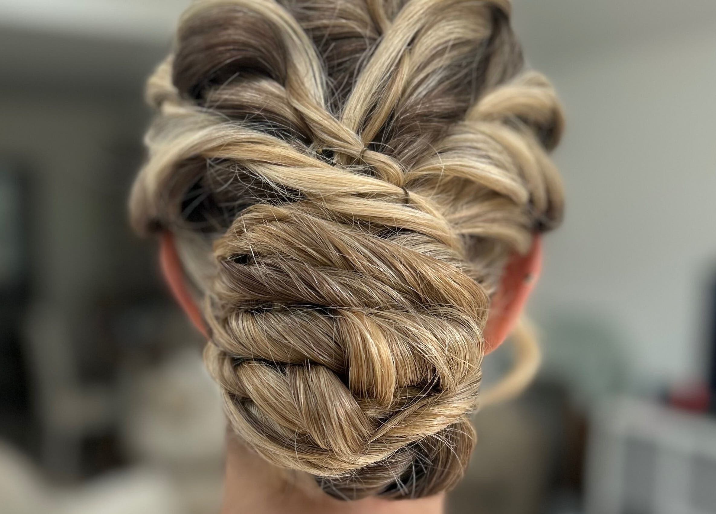 Intricate braided hairstyle at G.C Hair, Crowthorne, England, GB, showcasing elegant craftsmanship.