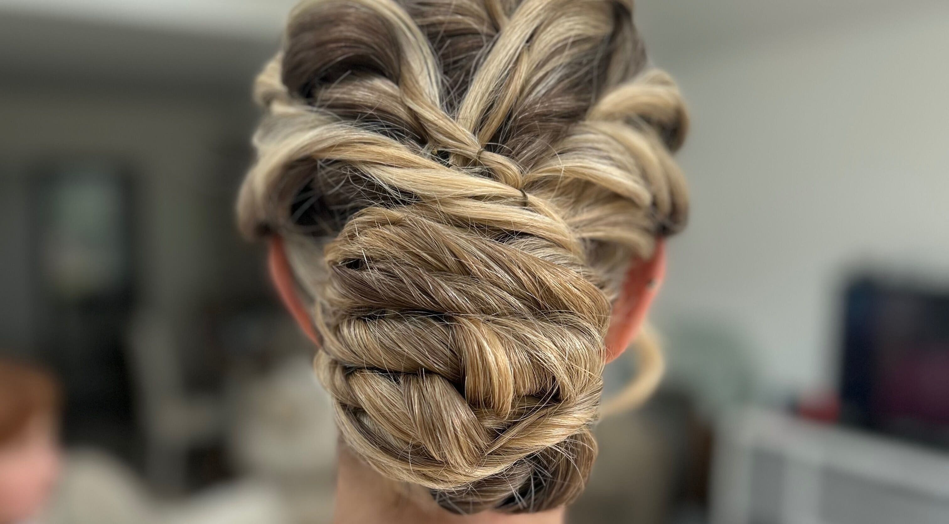 Intricate braided hairstyle at G.C Hair, Crowthorne, England, GB, showcasing elegant craftsmanship.