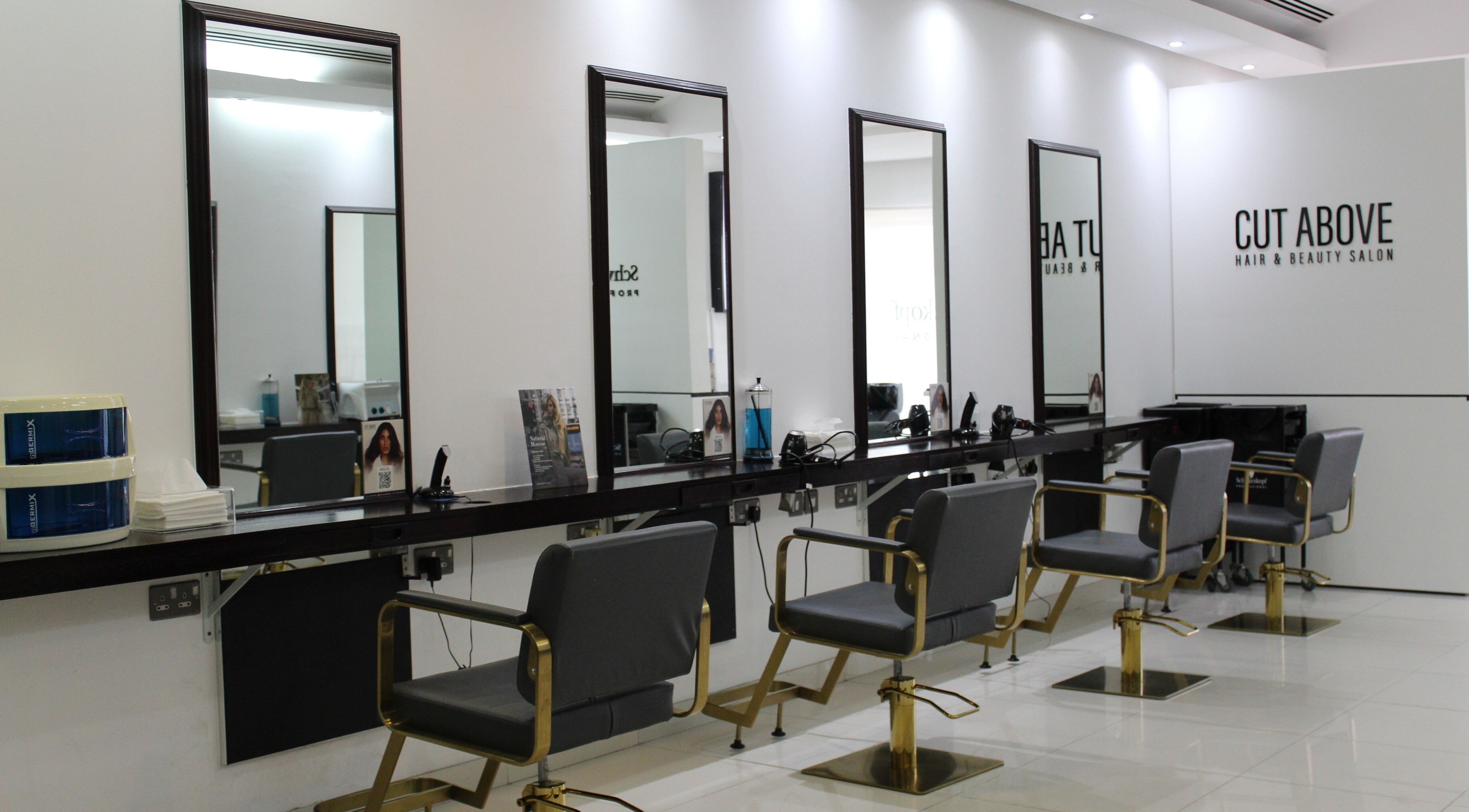Sleek and modern salon interior at Cut Above Ladies Salon, Dubai, Dubai, AE, showcasing styling stations.