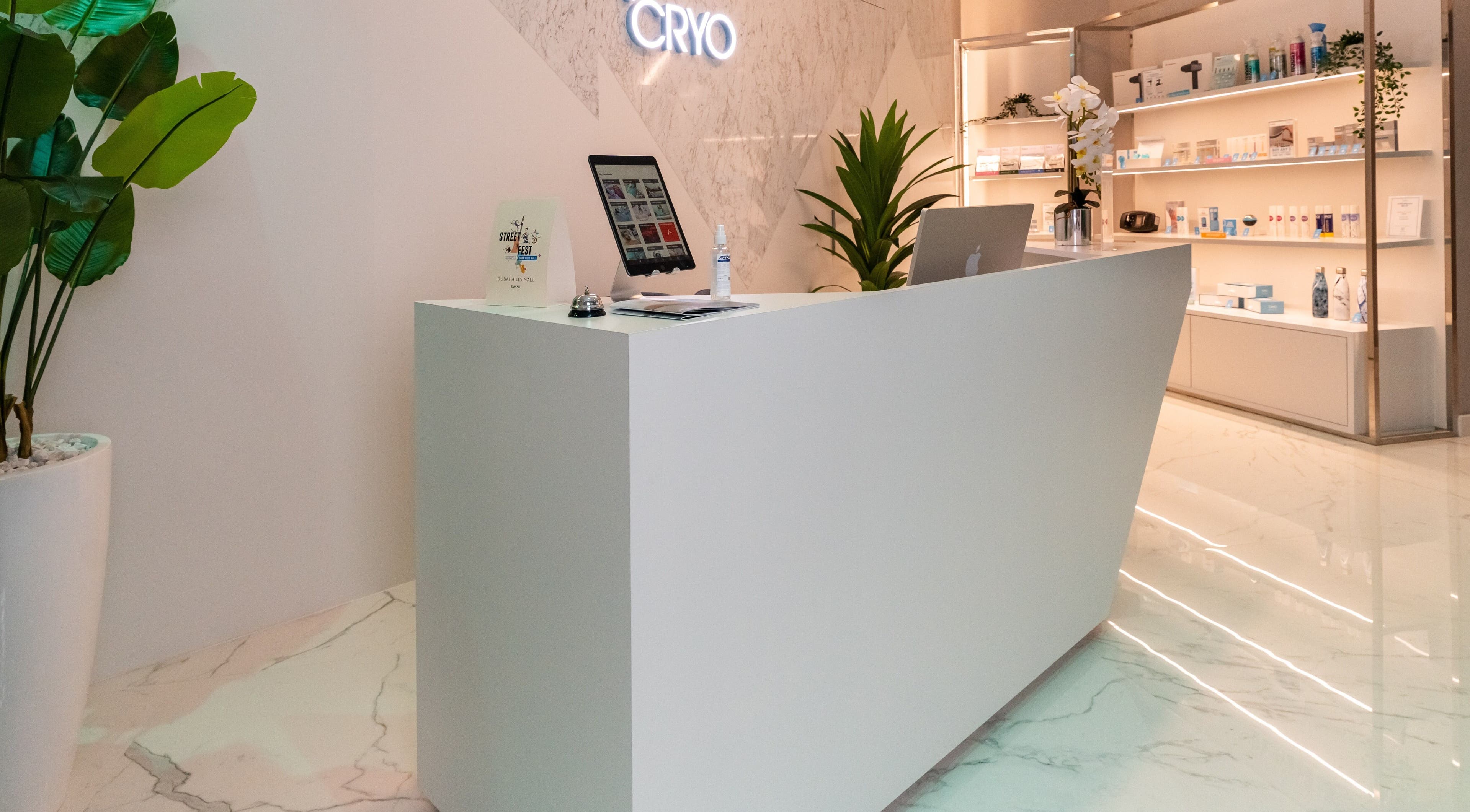 Elegant reception at °CRYO Dubai Hills Mall, Dubai, AE with modern decor and stylish displays.