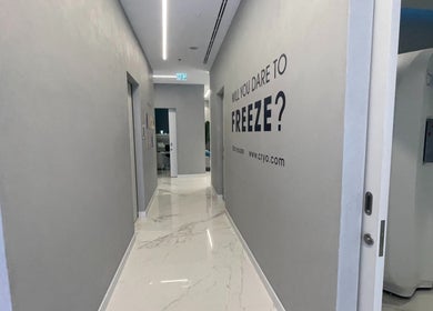 Sleek corridor at °CRYO Abu Dhabi Reem Mall offering wellness services in Abu Dhabi, Abu Dhabi, AE.