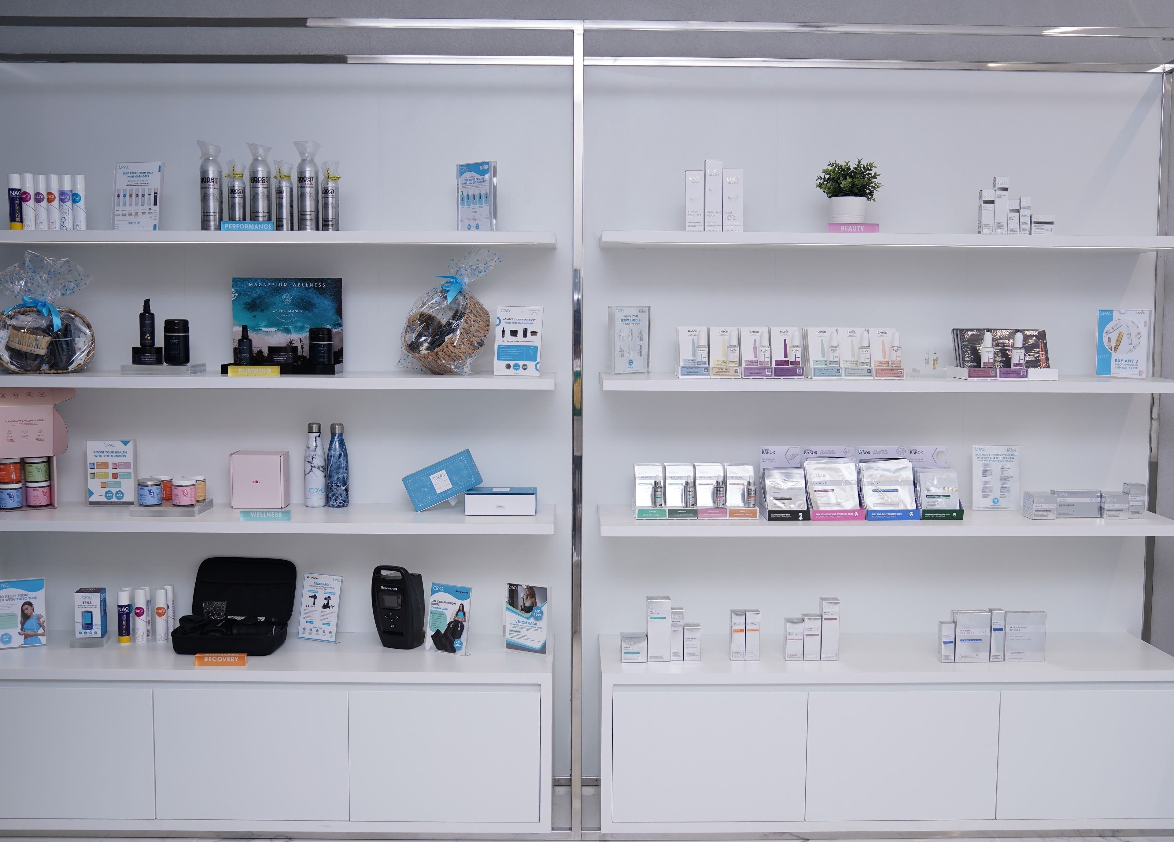 Sleek product shelves at °CRYO Abu Dhabi Reem Mall, Abu Dhabi, AE showcasing wellness and beauty items.