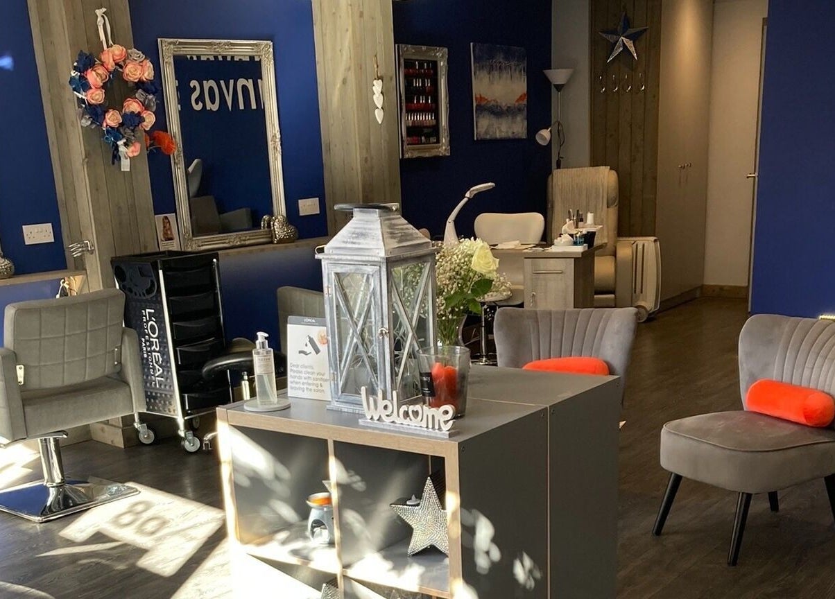 Modern salon interior at Canvas, York, England, GB with stylish chairs and welcoming decor.