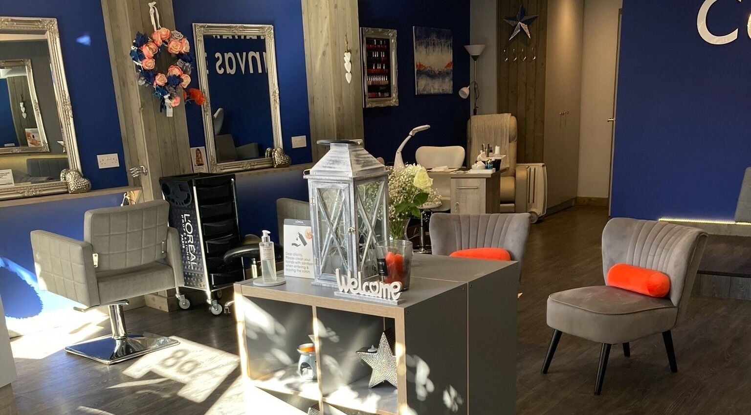 Modern salon interior at Canvas, York, England, GB with stylish chairs and welcoming decor.