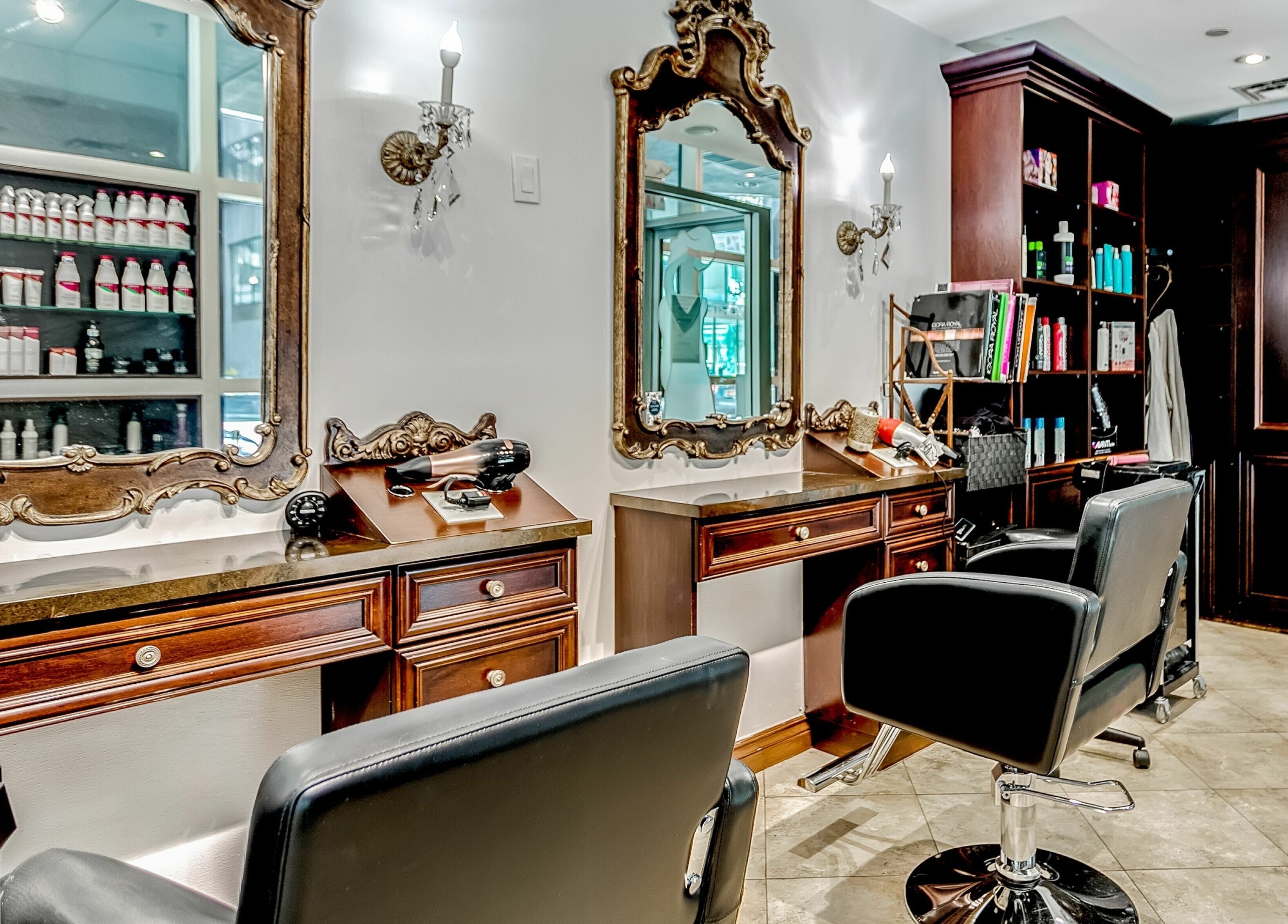 Chic salon chairs and ornate mirrors at La Jolie Femme Salon & Spa, Toronto, Ontario, CA.