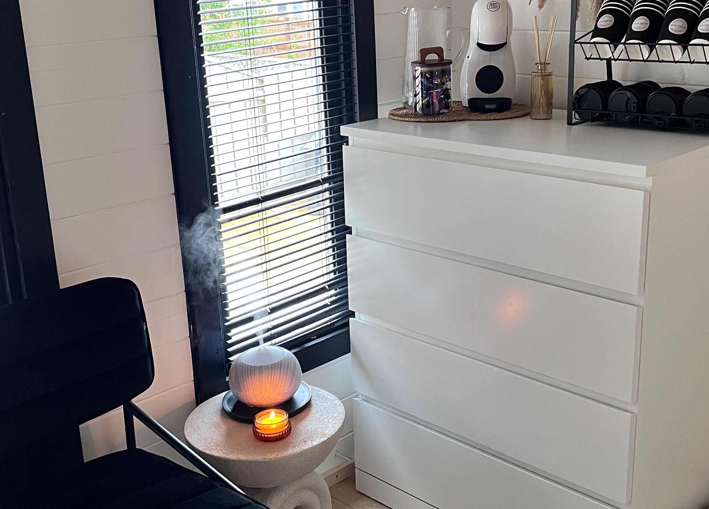 Modern relaxing corner at Nailed it with Anna, Annfield Plain, England, GB with cozy chair and diffuser.