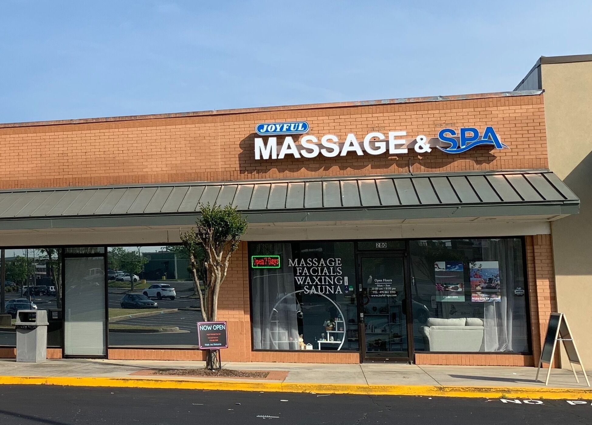 Exterior of Joyful Massage Day Spa LLC in Conyers, Georgia, US showcasing welcoming entrance.