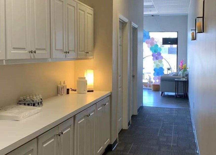 Modern, calming hallway at Joyful Massage Day Spa LLC in Conyers, Georgia, US, showcasing a tranquil atmosphere.