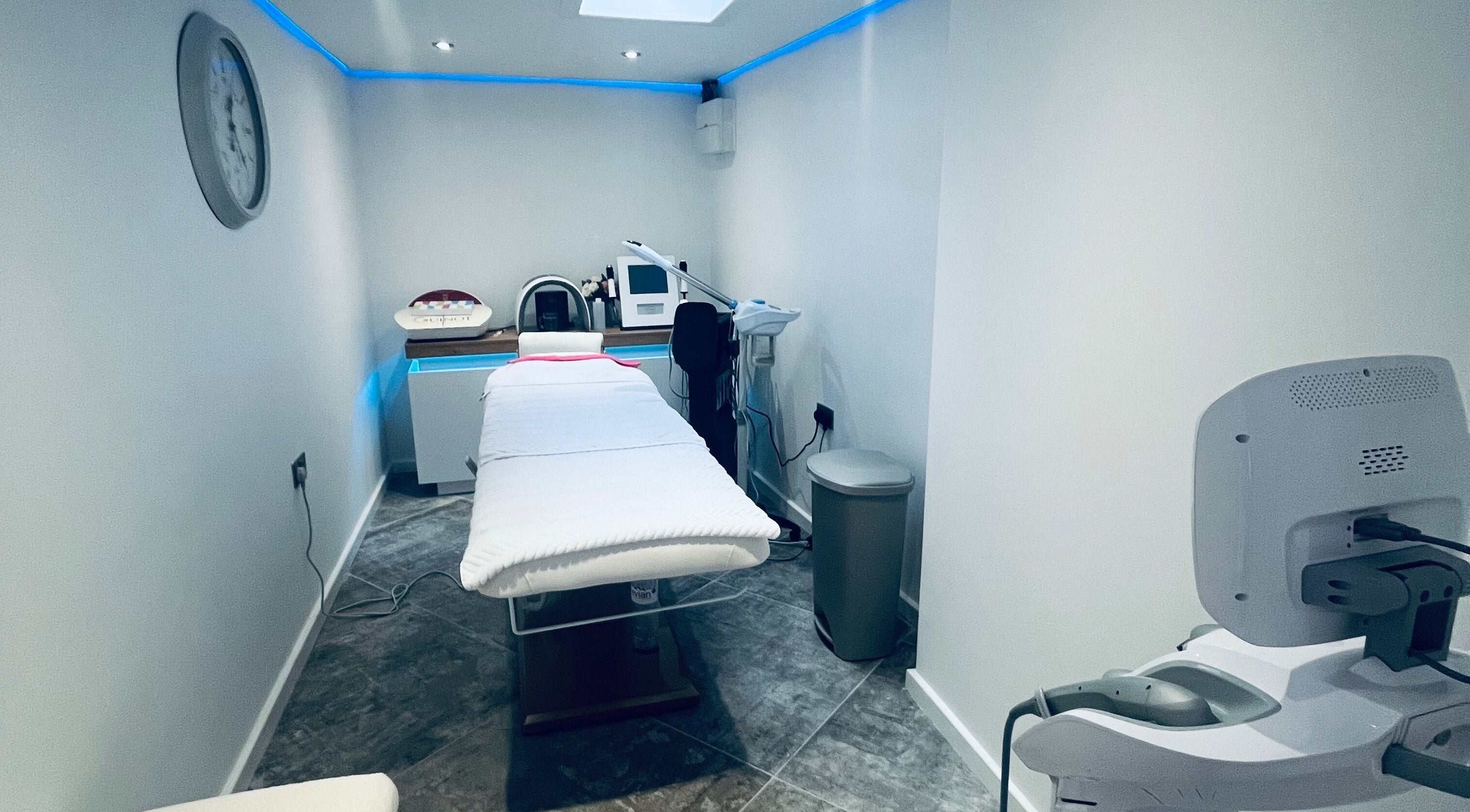 Modern treatment room at Oana Beauty Studio, Timsbury, England, GB, featuring a comfortable massage bed.