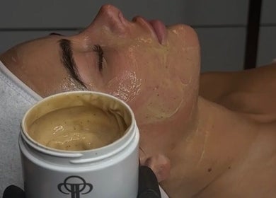 Facial treatment at Nu Image, Lowton, England, GB shows a client receiving a rejuvenating facial mask.