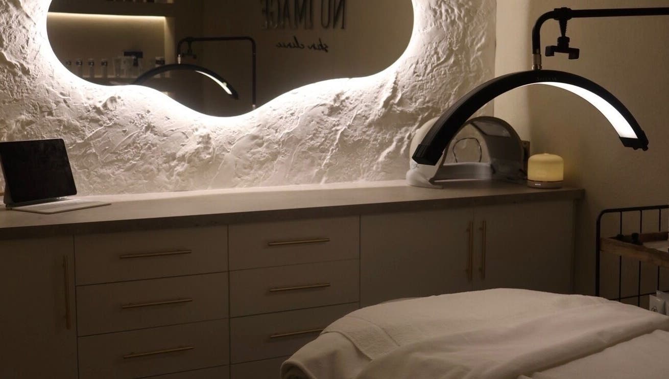 Relaxing spa room at Nu Image, Lowton, England, GB showcasing elegant design and soothing atmosphere.