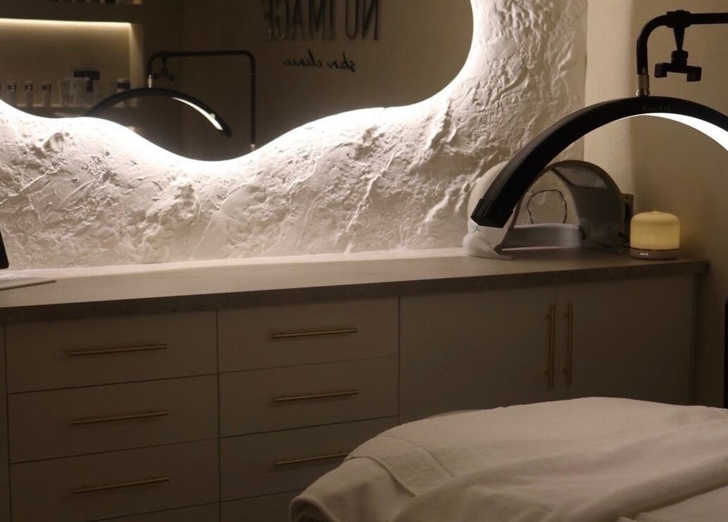 Relaxing spa room at Nu Image, Lowton, England, GB showcasing elegant design and soothing atmosphere.