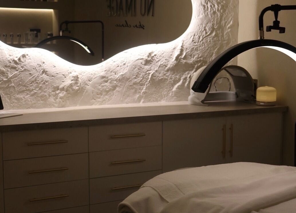 Relaxing spa room at Nu Image, Lowton, England, GB showcasing elegant design and soothing atmosphere.