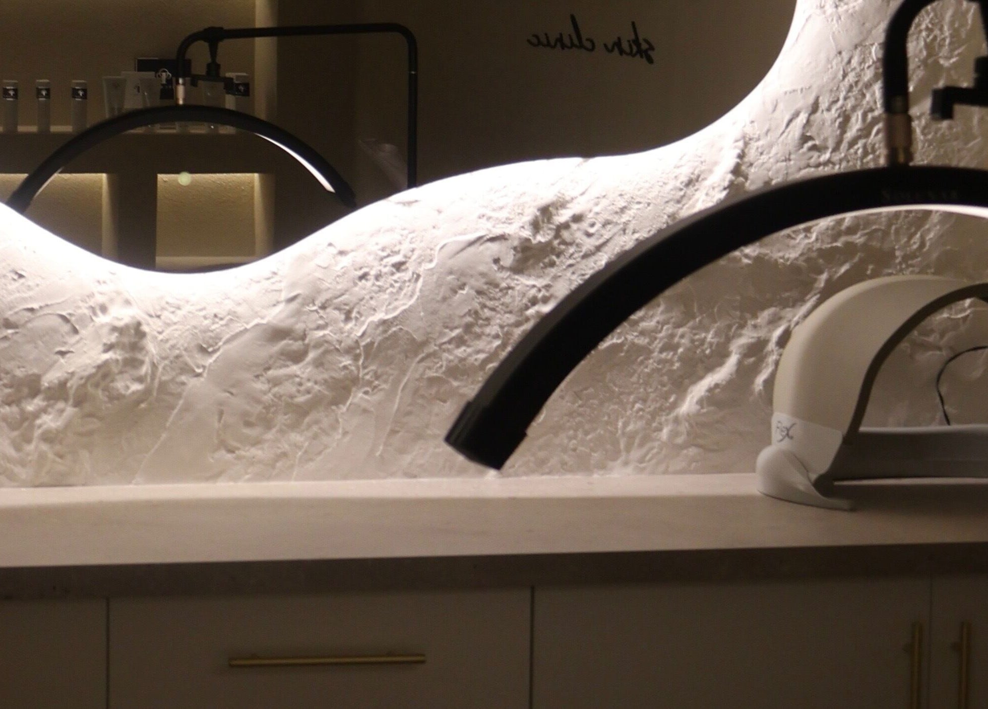 Modern wellness setup at Nu Image, Lowton, England, GB featuring sleek lighting and equipment.