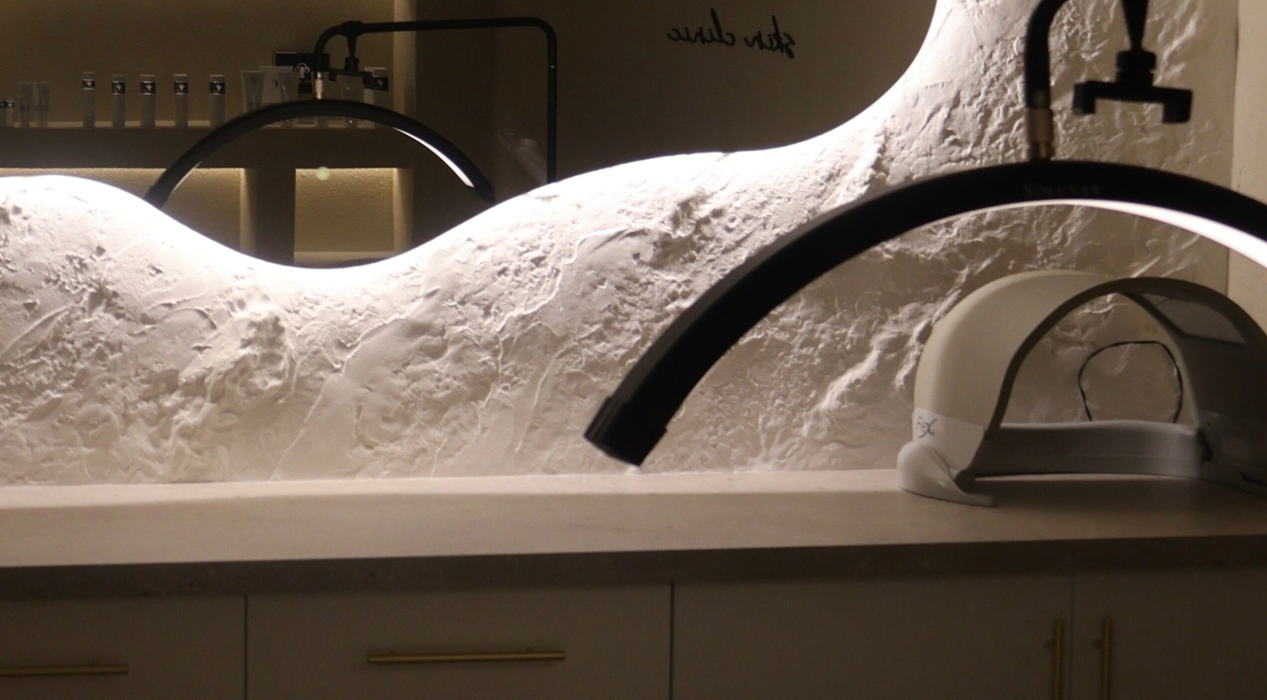 Modern wellness setup at Nu Image, Lowton, England, GB featuring sleek lighting and equipment.