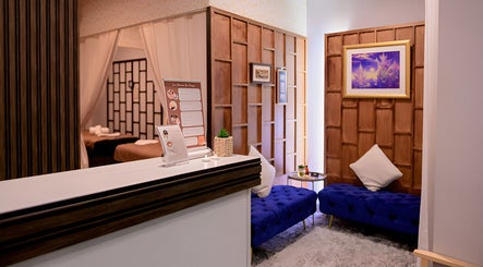 Elegant reception area at Siam Botanical Thai Massage in Melbourne, Victoria, AU with soothing decor and seating.