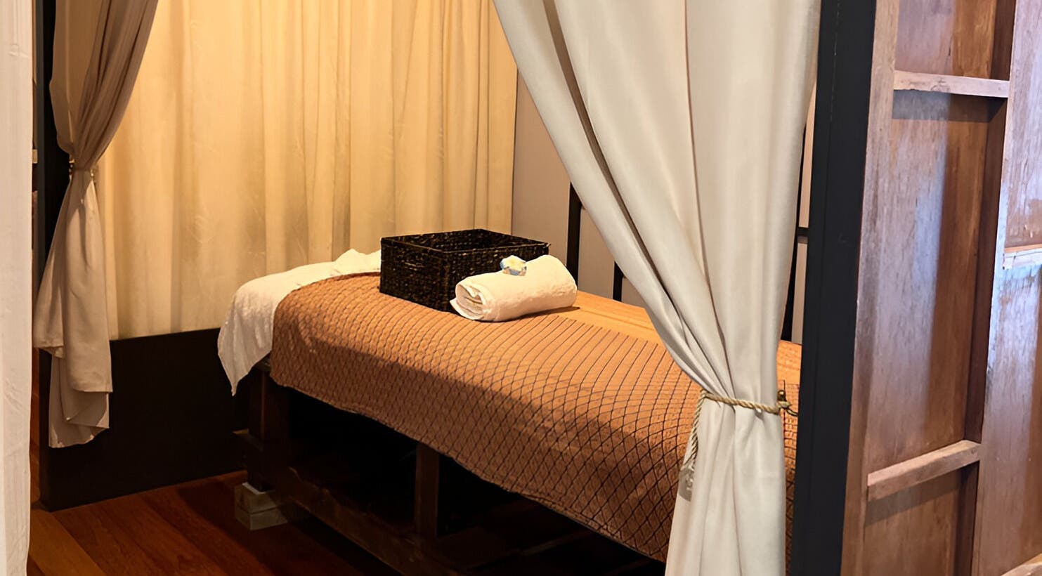 Tranquil massage room at Siam Botanical Thai Massage, Melbourne, Victoria, AU, featuring a cozy treatment bed.
