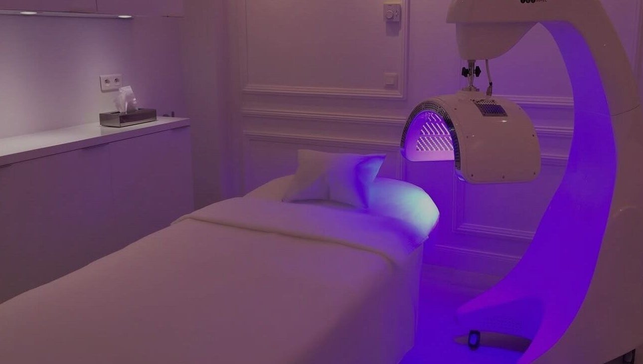 Treatment room at Elle Esthetics: Ashbourne Skin & Laser Clinic in Ashbourne, County Meath, IE with ambient lighting.